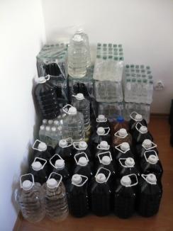 Băuturi alcoolice contrafăcute descoperite într-un ABC lângă sediul Poliţiei Beiuş (FOTO)